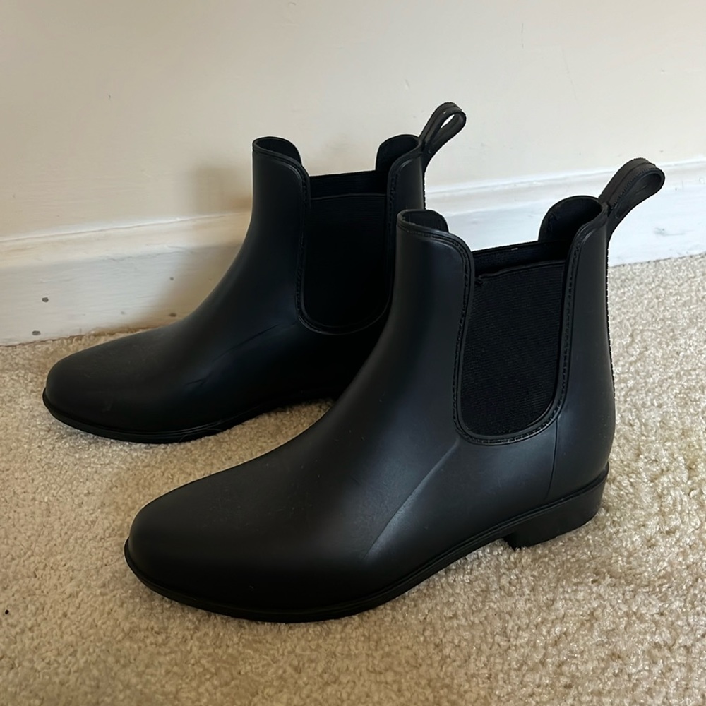 Lightly used black boots, water proof